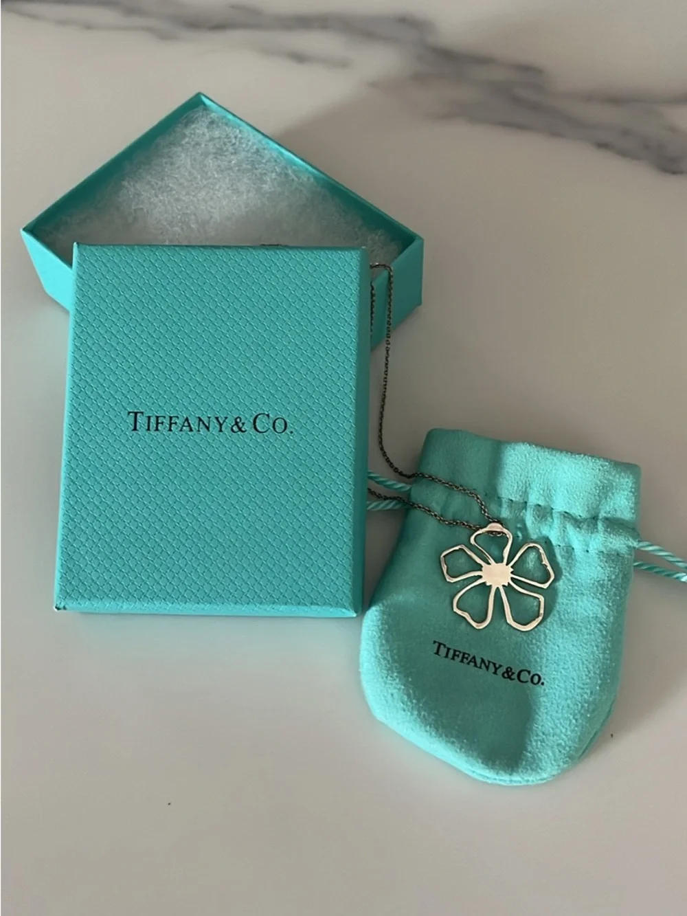 Tiffany & Co. Retired Sterling, silver hibiscus pendant necklace.